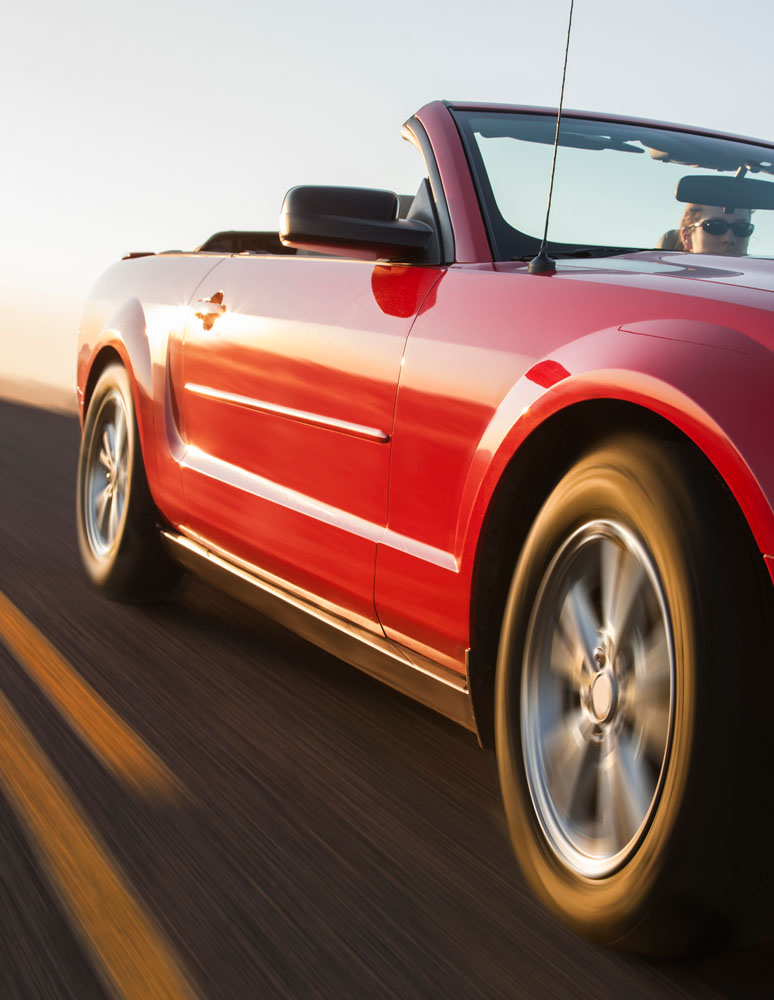 A low angle view of a convertible sports car movin 2021 08 28 17 41 04 utc 1.jpg