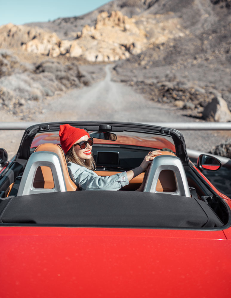 Woman traveling by cabriolet car on the desert roa 2021 09 02 01 41 39 utc.jpg